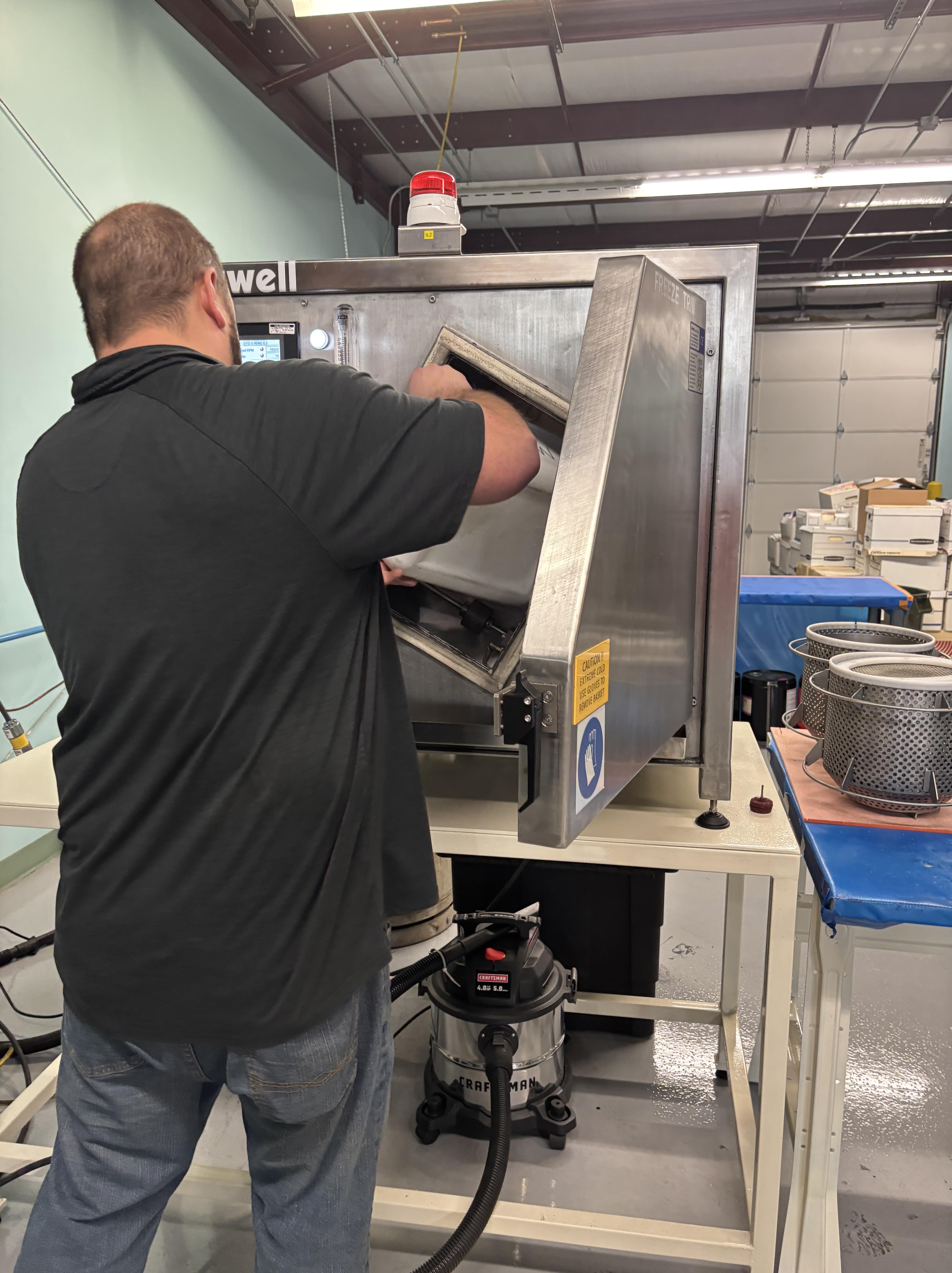 PolyMod Employee Utilizing Machinery for Seal Production