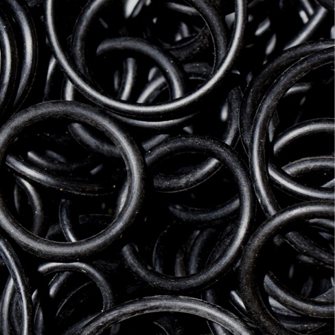 Pile of black quality o-ring seals up-close.