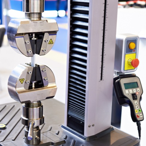Tensile testing machine. PolyMod® Technologies Inc.’s accredited laboratory has specialized equipment to perform a range of tests on seals and elastomeric materials and determine chemical and mechanical properties.